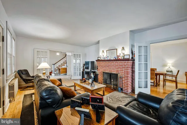 a kitchen with granite countertop a sink stove and cabinets