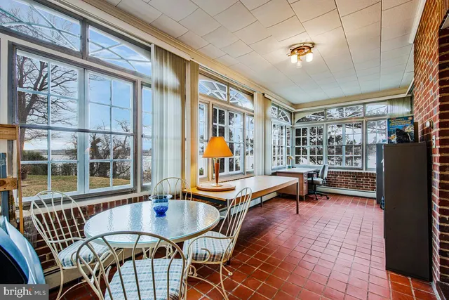 a kitchen with stainless steel appliances kitchen island granite countertop a sink and cabinets