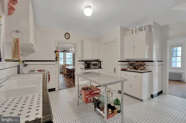 a bathroom with a sink and a shower
