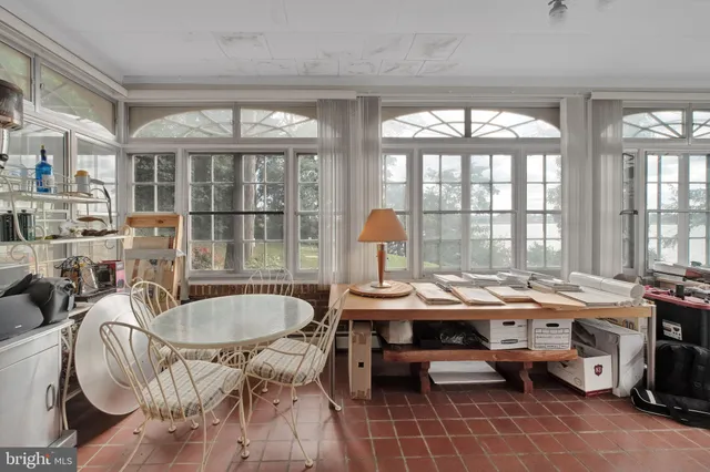 a view of a lake with houses in the back