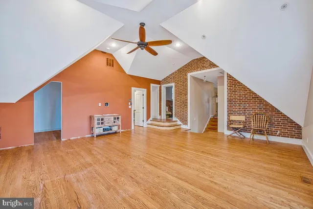 a bed room with a bed and a window