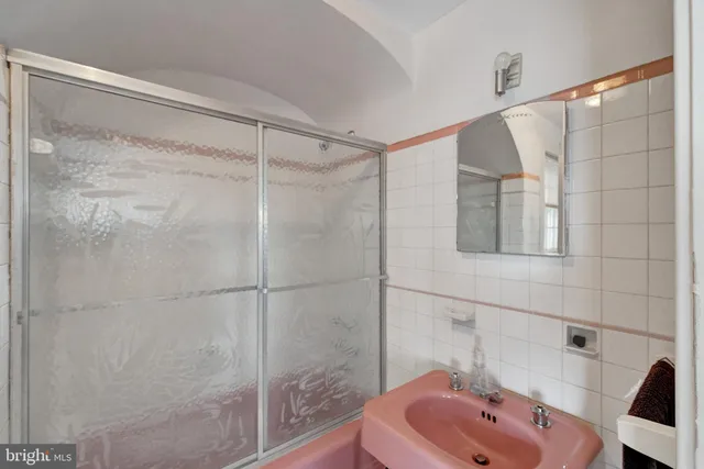 a dining room with a table and chairs