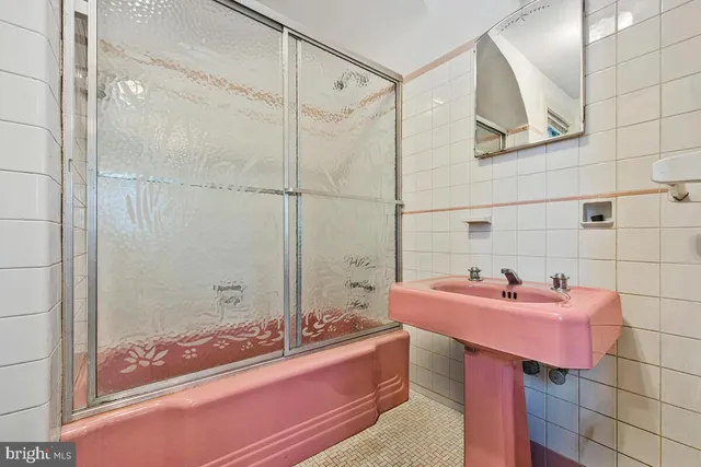 a view of a lake with houses in the back