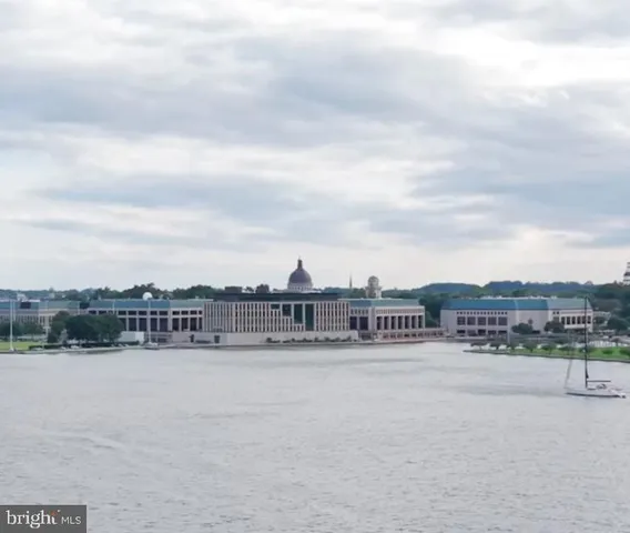 a front view of house with yard outdoor seating and barbeque oven