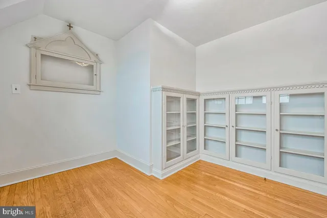 a utility room with lots of gym equipment