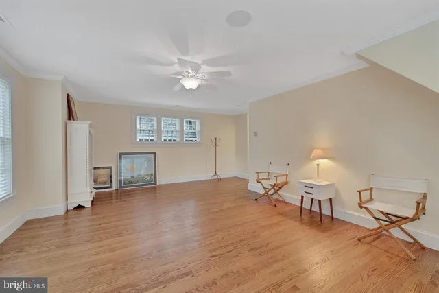 a view of a brick house with an outdoor space