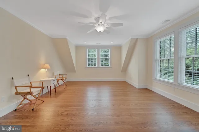 a front view of a house with a yard and porch