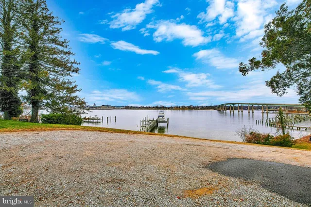 a front view of house with yard outdoor seating and barbeque oven