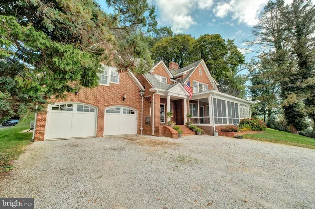 a view of a kitchen with a sink and a stove