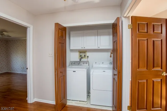 a view of kitchen with wooden floor