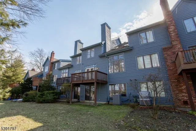 a view of a building with a yard