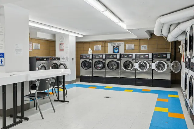 a living room with furniture and rug