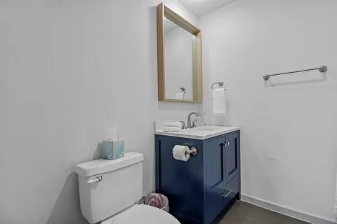 3130 Barton Road Carrollton, TX 75007 - Photo 12 of 16 a bathroom with a sink and a toilet