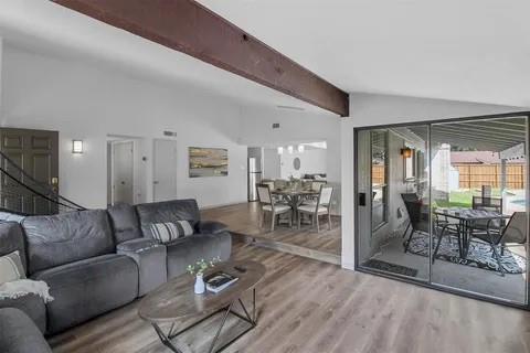 3130 Barton Road Carrollton, TX 75007 - Photo 4 of 16 a living room with furniture and a large window
