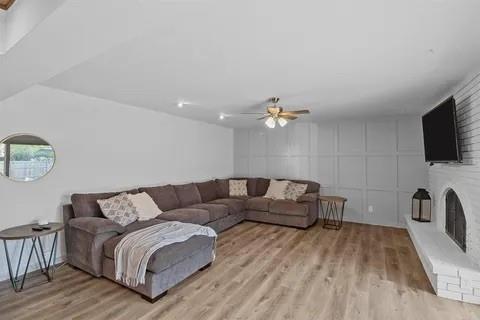 3130 Barton Road Carrollton, TX 75007 - Photo 6 of 16 a living room with furniture and a flat screen tv