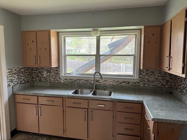 3841 Joest Drive Memphis, TN 38127 - Photo 14 of 21 a kitchen with granite countertop a sink window and cabinets