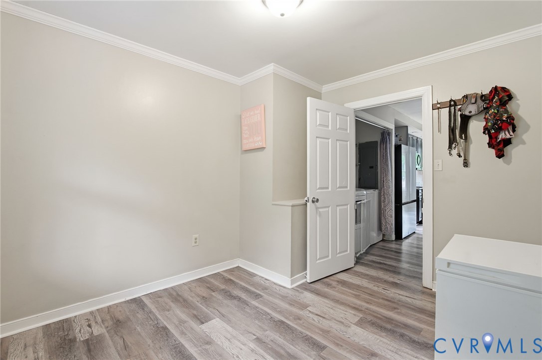 9110 Gayton Road Henrico, VA 23229 - Photo 15 of 54 a view of a hallway with wooden floor and closet