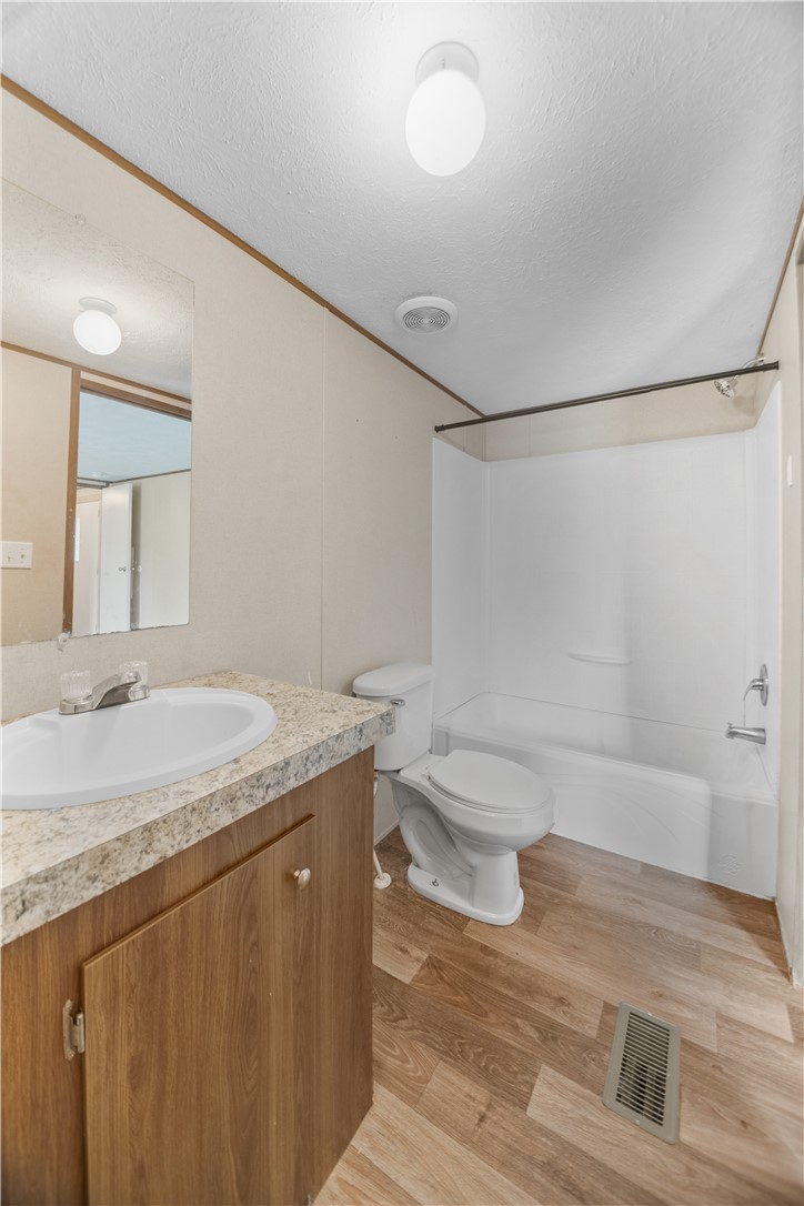 1188 Old Liberty Road Easley, SC 29640 - Photo 21 of 28 This bright bathroom features a spacious vanity and practical flooring, ideal for daily routines.