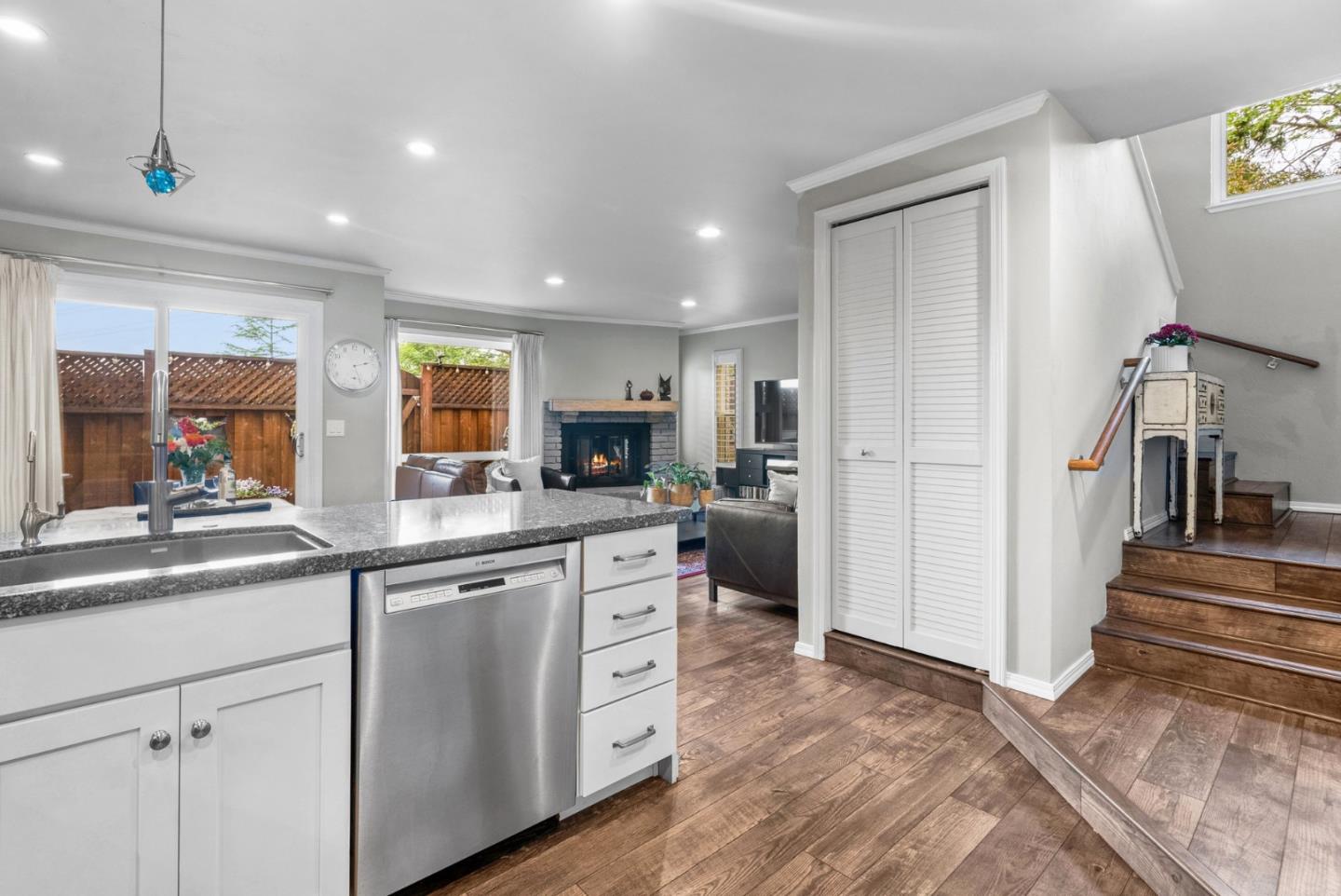 3071 Arlington Drive Aptos, CA 95003 - Photo 18 of 54 a kitchen with white cabinets and sink