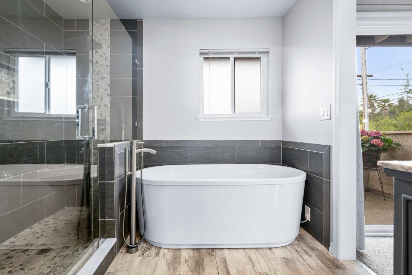 3071 Arlington Drive Aptos, CA 95003 - Photo 25 of 54 a white bath tub sitting in a bathroom