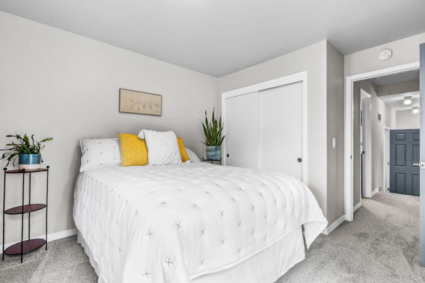 3071 Arlington Drive Aptos, CA 95003 - Photo 34 of 54 a bedroom with a bed and painting on the wall