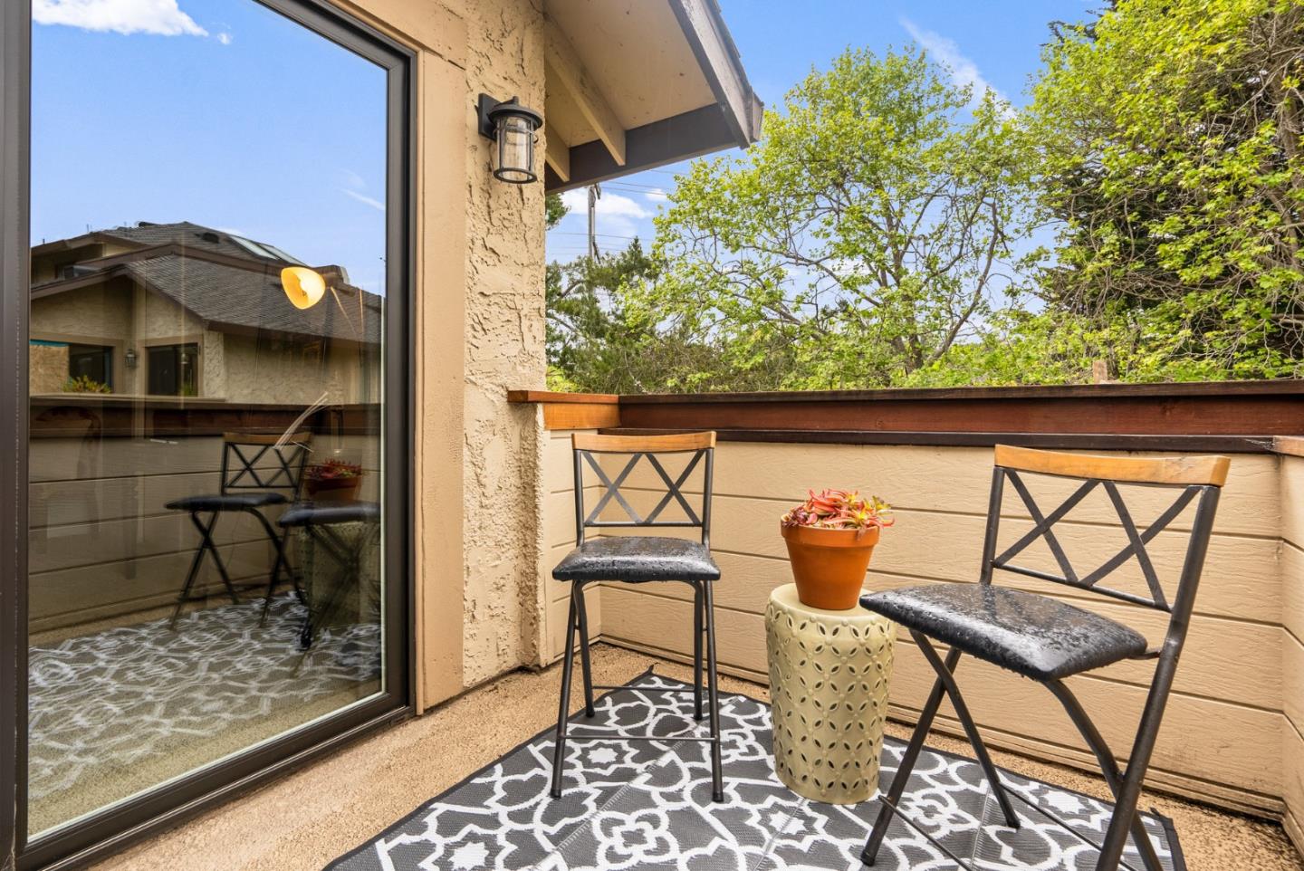 3071 Arlington Drive Aptos, CA 95003 - Photo 37 of 54 a view of a chairs and table in the patio