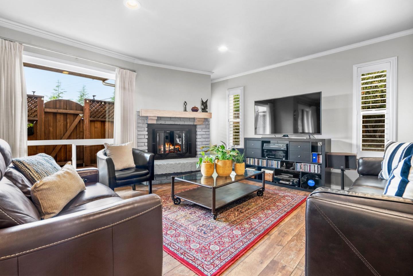 3071 Arlington Drive Aptos, CA 95003 - Photo 4 of 54 a living room with furniture and a fireplace