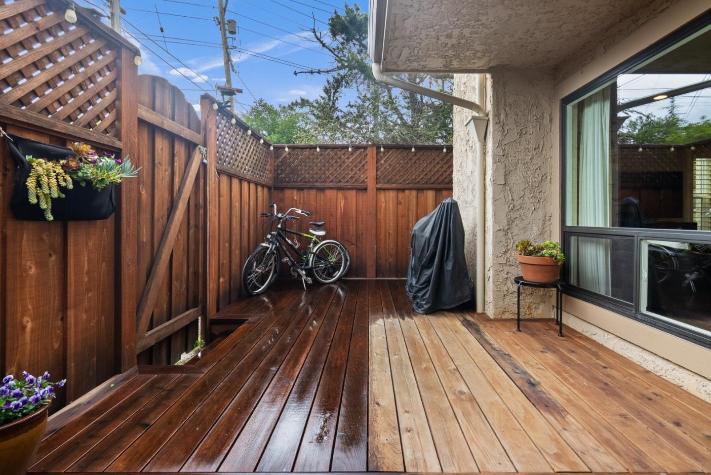 3071 Arlington Drive Aptos, CA 95003 - Photo 44 of 54 a view of a balcony with chairs and wooden floor