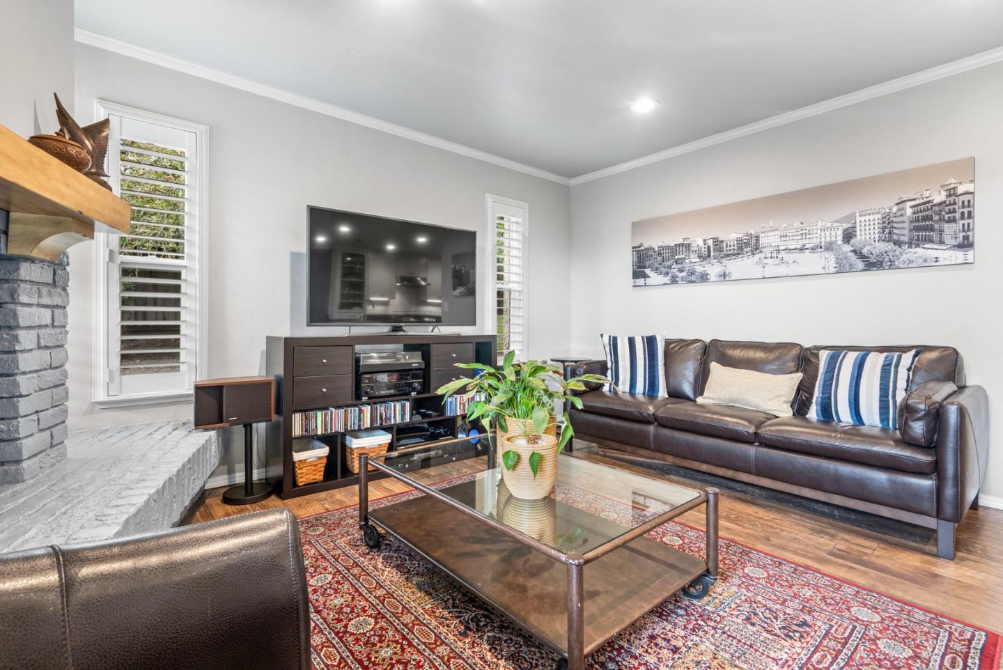 3071 Arlington Drive Aptos, CA 95003 - Photo 5 of 54 a living room with furniture potted plant and a flat screen tv