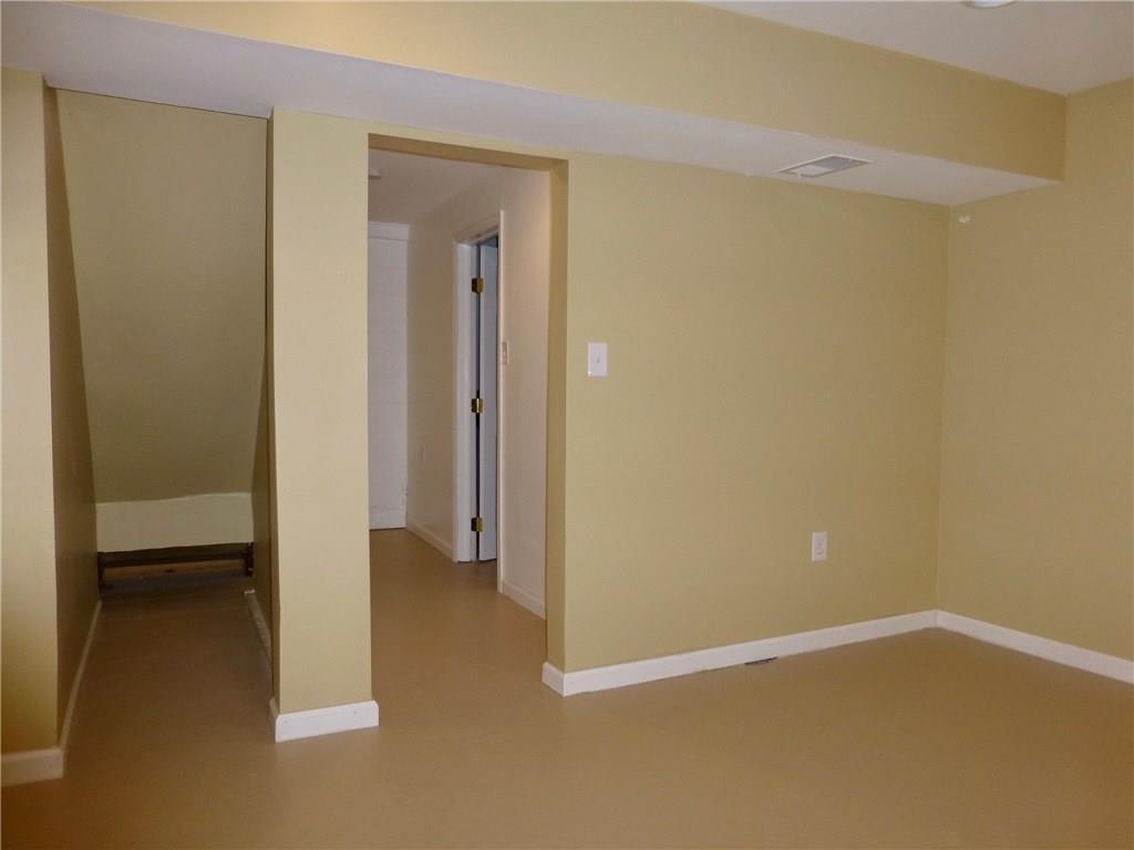 2808 McKelvey Road Pittsburgh, PA 15221 - Photo 18 of 22 Gameroom entrance and storage under stairs