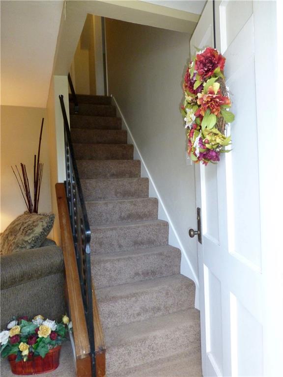 Front entrance, stairs to 2nd floor
