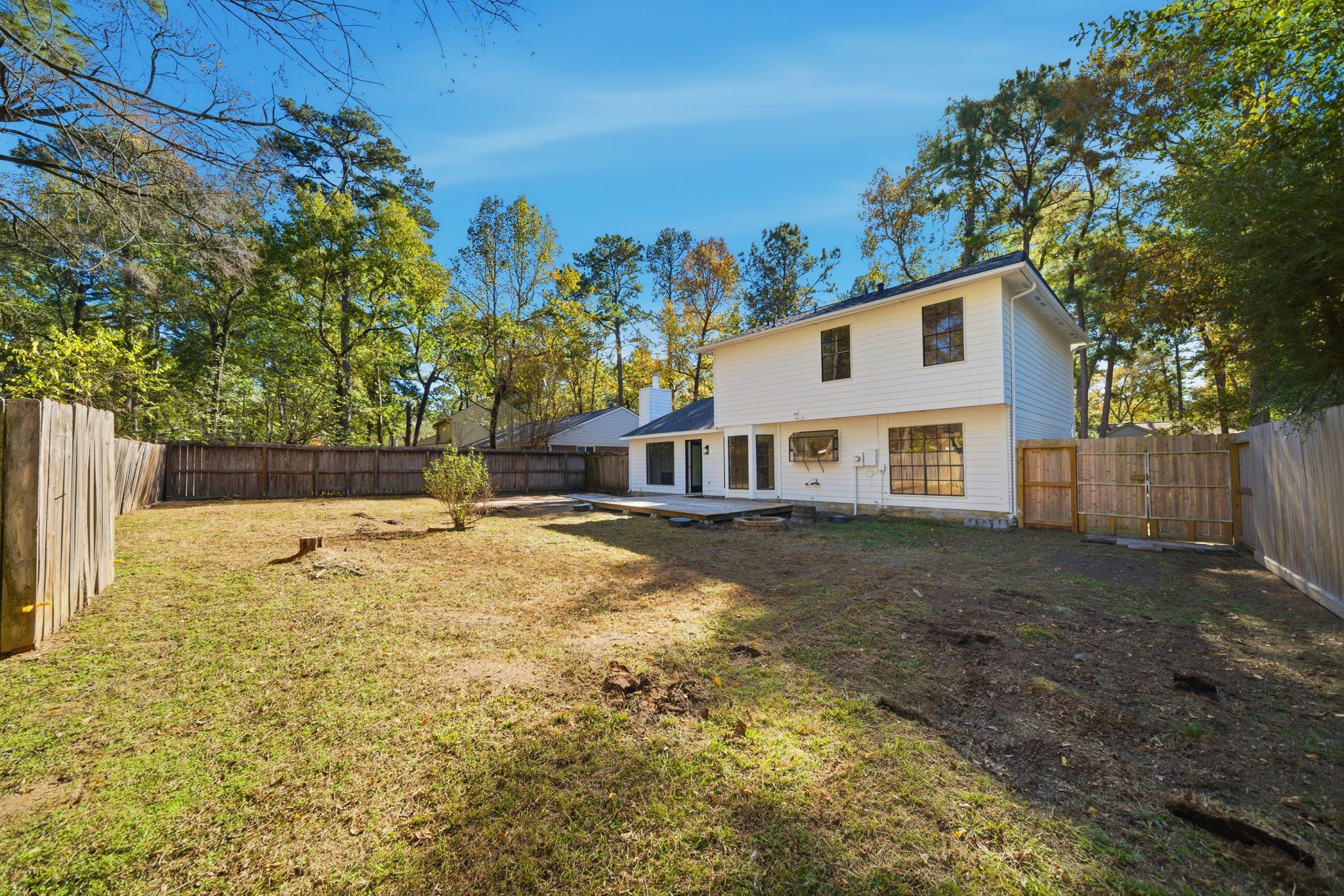 22 Cricket Hollow Place Spring, TX 77381 - Photo 17 of 29 Backyard With Wood Deck