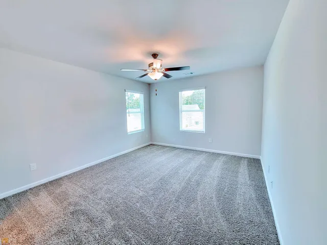 a picture of a bench in a white building