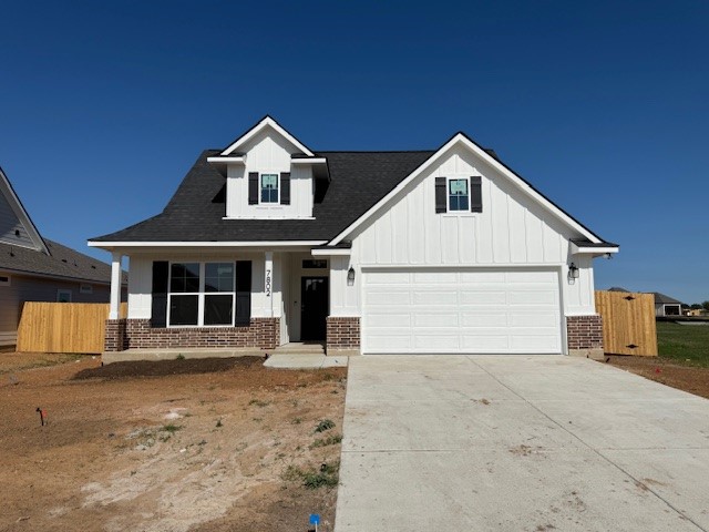 a view of white house with large windows