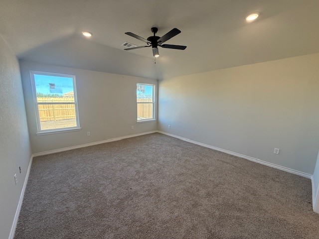 7802 Redbud Road Navasota, TX 77868 - Photo 19 of 24 an empty room with a window and a ceiling fan