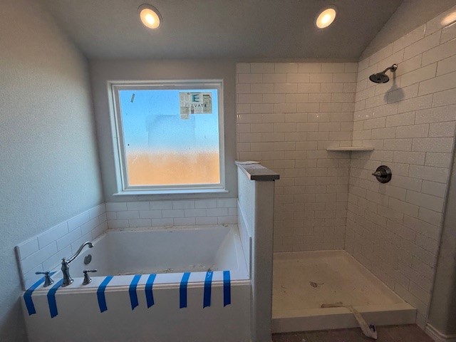 7802 Redbud Road Navasota, TX 77868 - Photo 22 of 24 a bathroom with a bathtub and shower