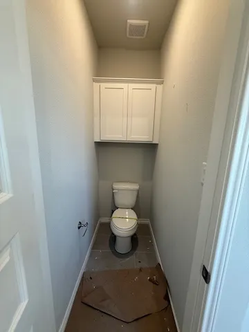 a bathroom with a toilet
