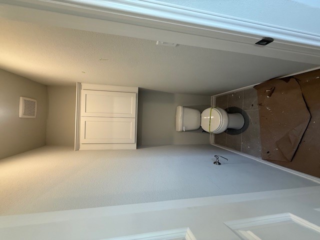 7802 Redbud Road Navasota, TX 77868 - Photo 23 of 24 a bathroom with a toilet