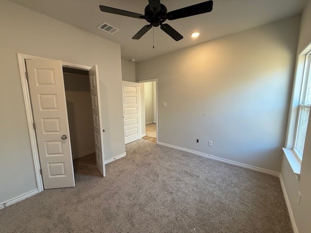 7802 Redbud Road Navasota, TX 77868 - Photo 6 of 24 an empty room with windows and fan