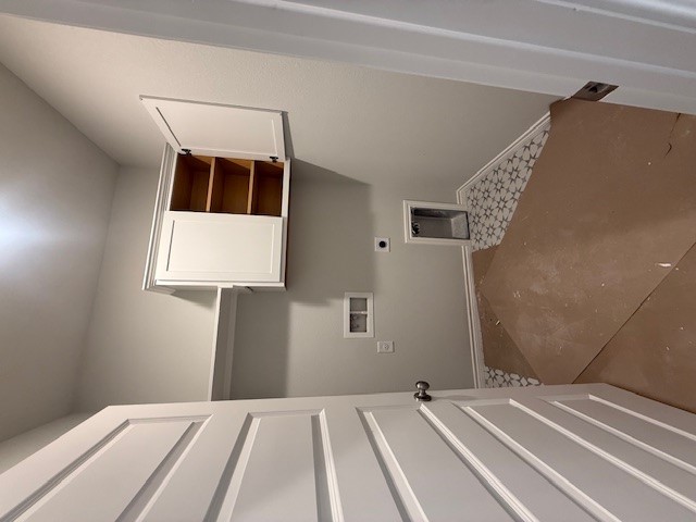 7802 Redbud Road Navasota, TX 77868 - Photo 7 of 24 a room with storage and utility