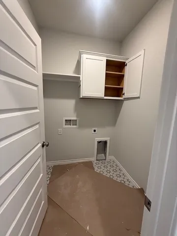 a view of cabinets and wooden floor