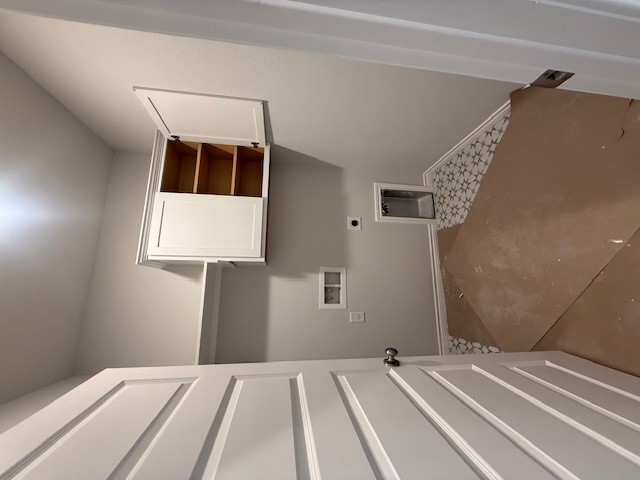 7802 Redbud Road Navasota, TX 77868 - Photo 8 of 24 a view of cabinets and wooden floor