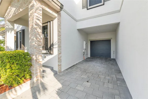 a view of a back yard of the house