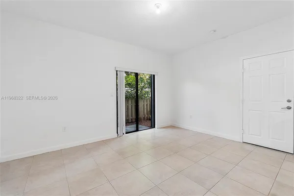 a view of an empty room with window