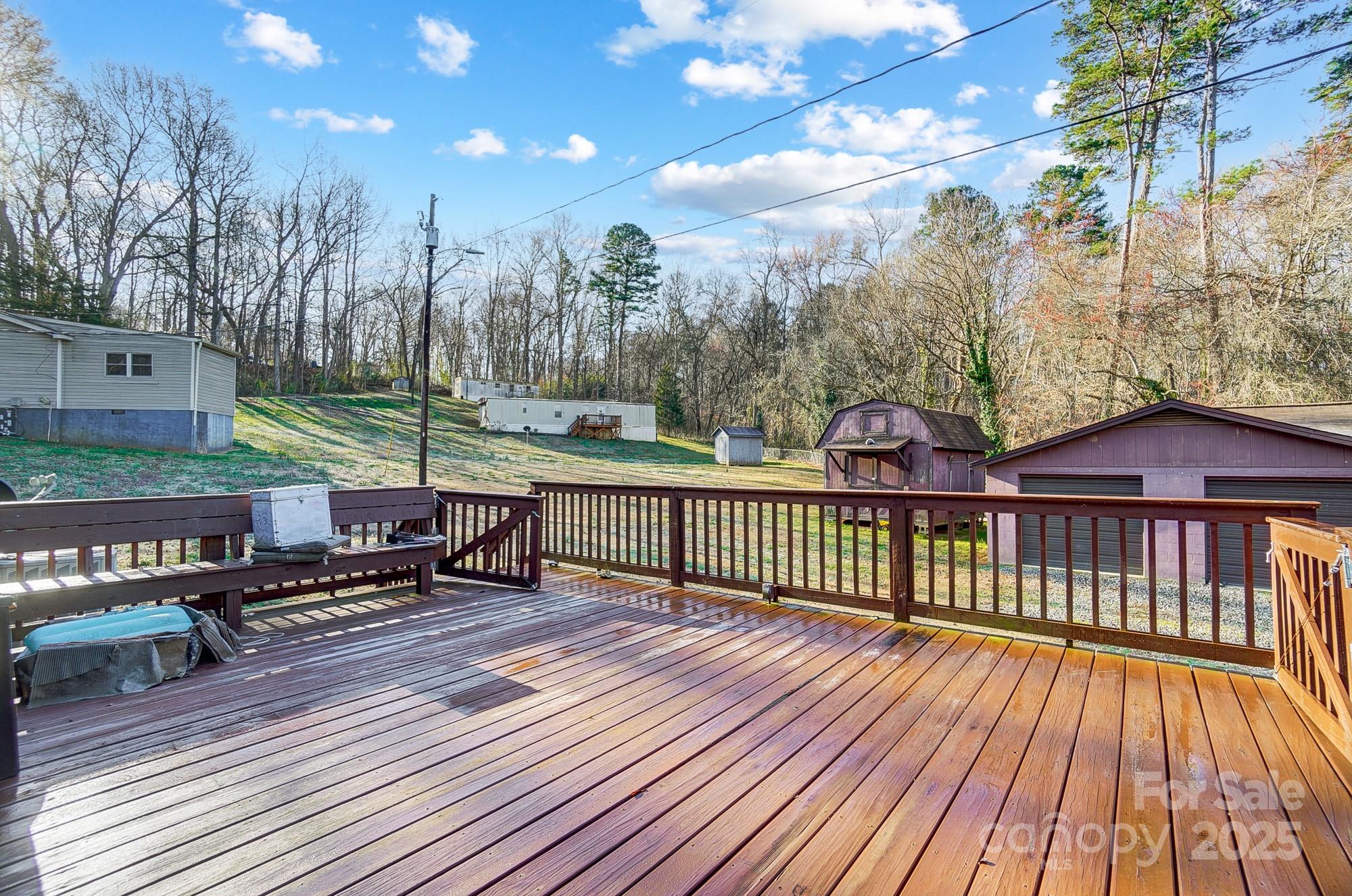 455 Pinhook Loop Road Gastonia, NC 28056 - Photo 7 of 15 a view of a wooden chairs and table on the wooden floor