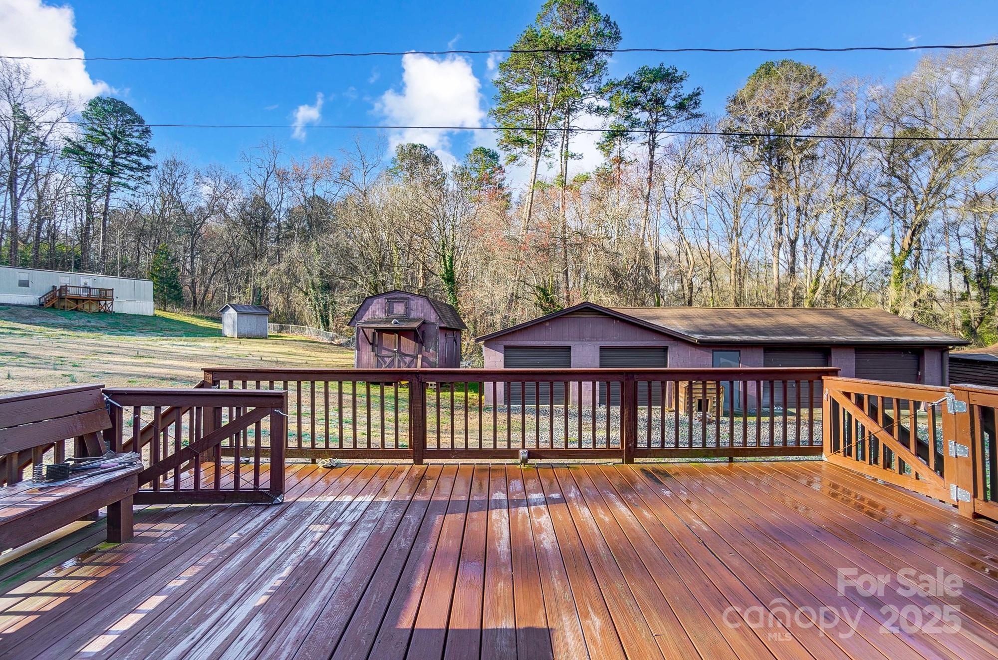 455 Pinhook Loop Road Gastonia, NC 28056 - Photo 8 of 15 a view of a wooden deck with a yard