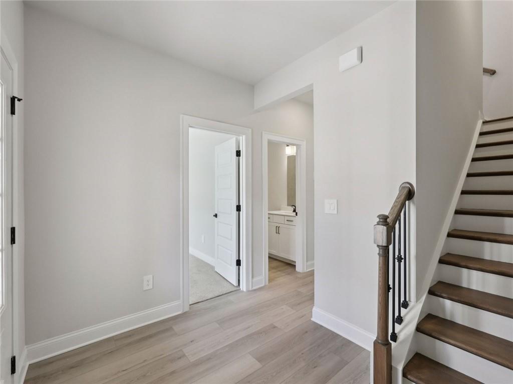 508 McCrae Road Lawrenceville, GA 30045 - Photo 12 of 22 a view of a hallway with wooden floor and entryway
