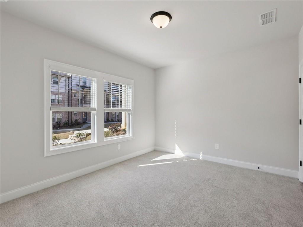 508 McCrae Road Lawrenceville, GA 30045 - Photo 13 of 22 an empty room with a window