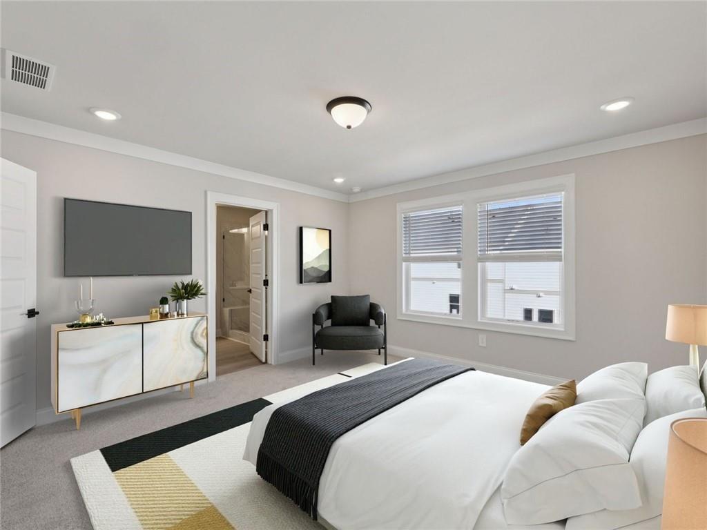 508 McCrae Road Lawrenceville, GA 30045 - Photo 15 of 22 a bedroom with a bed and a flat screen tv