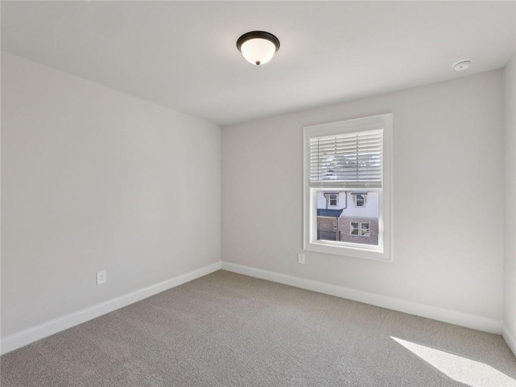 508 McCrae Road Lawrenceville, GA 30045 - Photo 17 of 22 an empty room with a window
